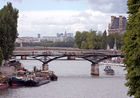 Pont des Arts pedestrian bridge with Pont du Carrousel behind it