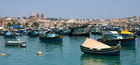 Luzzu (fishing boats) in Marxaxlokk Bay