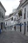 A traditional street (note the blue pots)