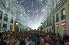 The crowds form at Calle Marques de Larios