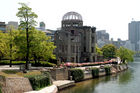 A-Bomb Dome with modern Hiroshima as background (blast epicentre is just behind the dome)