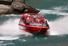 Jetboat hurtles along the Shotover river, near Arthurs Point
