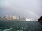 Rainbow over Sydney business district 