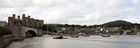 Panoramic view of Conwy featuring the medieval castle and modern bridge